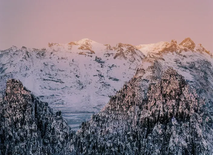 Image similar to symmetry!! a 2 8 mm macro tilt shift view of a beautiful rugged snowy mountain range, photography, film, film grain, canon 5 0 mm, cinematic lighting, golden hour, hazy,