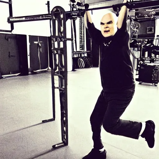 Prompt: Billy Corgan lifting heavy music gear