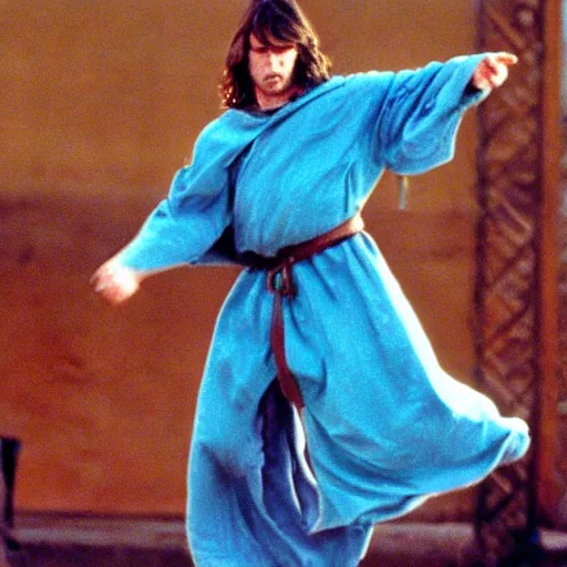 Prompt: a man with long brown hair with a light blue cloak, medieval clothes, kicking in the air, 1 9 9 1, movie still