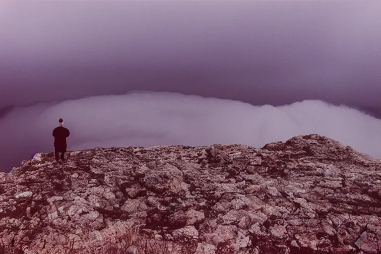 Image similar to gigachad on top of a tall mountain, blue fog, tornadoes surrounding, film photography, soft lighting, vignette