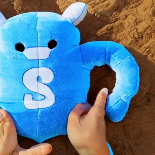 Image similar to blue'snappy gifts'logo human - sized plush doll, looking at the camera, in the desert, holding gift, happy atmosphere, high detail, 8 k