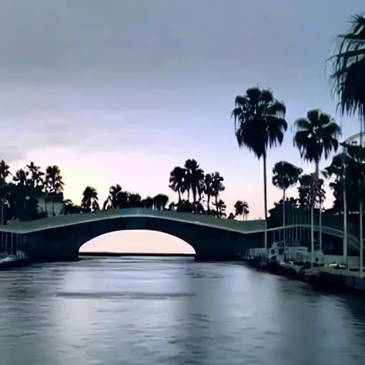 Image similar to blue hour, mostly cloudy sky, palm trees, bridge, curved bridge, dusk, 2 4 0 p footage, 2 0 0 6 youtube video, 2 0 0 6 photograph, low quality photo, home video