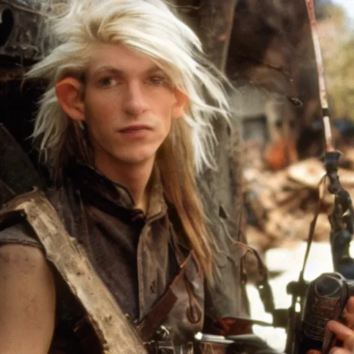 Prompt: close up headshot of a skinny high-fantasy elf with a long narrow face and spiky blonde hair wearing dark brown overalls and holding a bomb next to a destroyed car, high resolution film still, fim by Peter Jackson