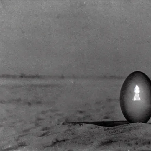 Image similar to an early 1 9 0 0 s photograph of an alien peeking out from a levitating luminescent alien egg on the beach, moonlight, at nighttime,