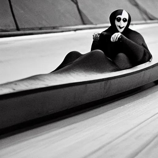 Image similar to portrait of nosferatu is doing bobsleigh alone, sport photography