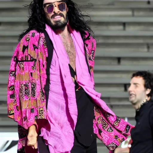 Prompt: russell brand kicking himself in the head while wearing a pink dashiki