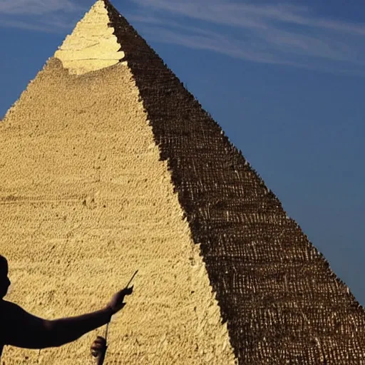 Prompt: a gigantic man building a pyramid with his hands