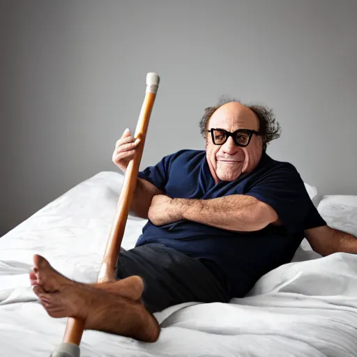 Image similar to Danny DeVito laying on a bed playing with his didgeridoo, cinematic, studio light, 8K,