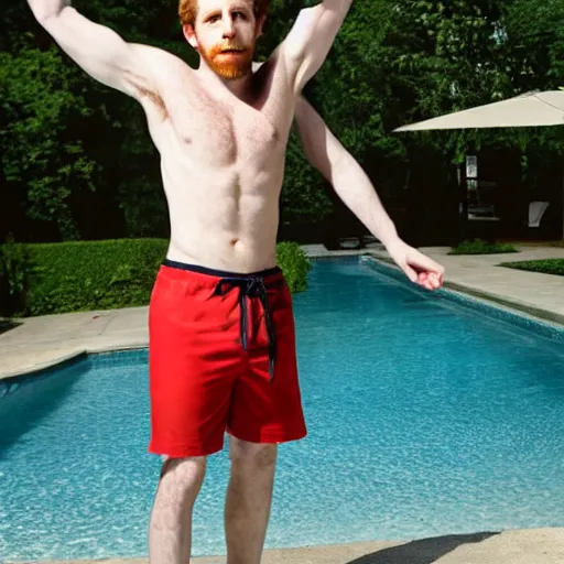 Image similar to actor Seth Green posing for picture in swimming trunks, photograph