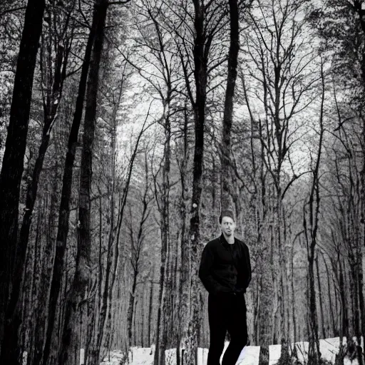 Image similar to black and white portrait of ryan winter in the forest