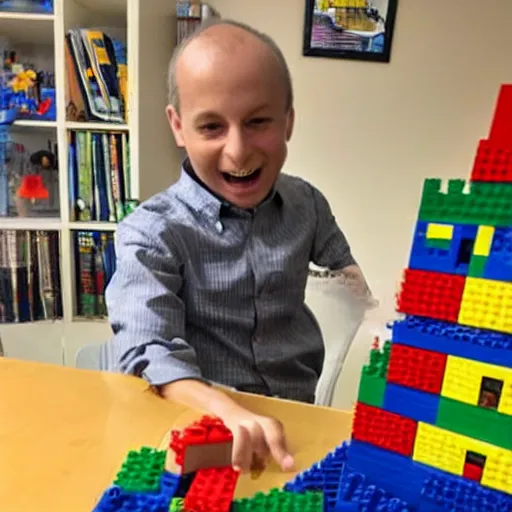 Image similar to A photo of Naftali Bennett playing with legos in his office, high quality