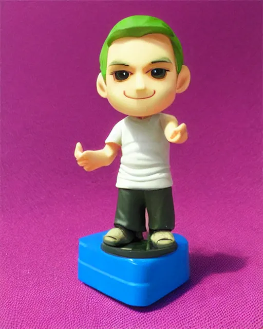 Image similar to a cute little plastic chibi statuette of jerma 9 8 5 on computer, ebay listing, product picture, advertisement, thumbnail