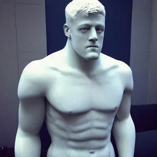 Prompt: “a realistic detailed photo of a guy who is an attractive humanoid who is half robot and half humanoid, who is a male android, football player JJ Watt, shiny skin, posing like a statue, blank stare”