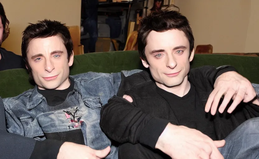 Prompt: john travolta and elijah wood sitting on a couch playing video game xbox ps 2