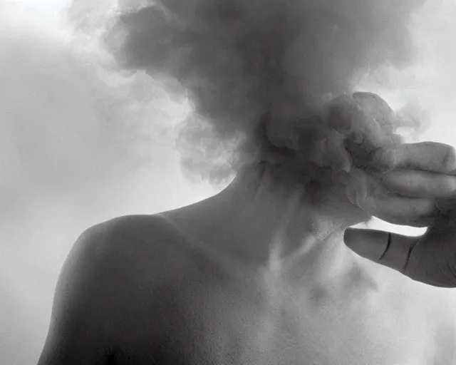 Image similar to a man who's head is turning into a puff of smoke, annie liebowitz, black and white