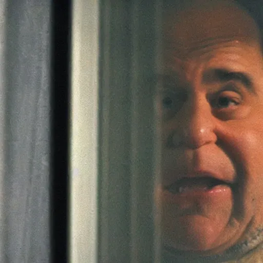 Prompt: still image from a found footage movie of devito staring hungrily through a window at night