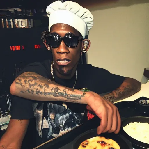 Prompt: young thug cooking in the studio,