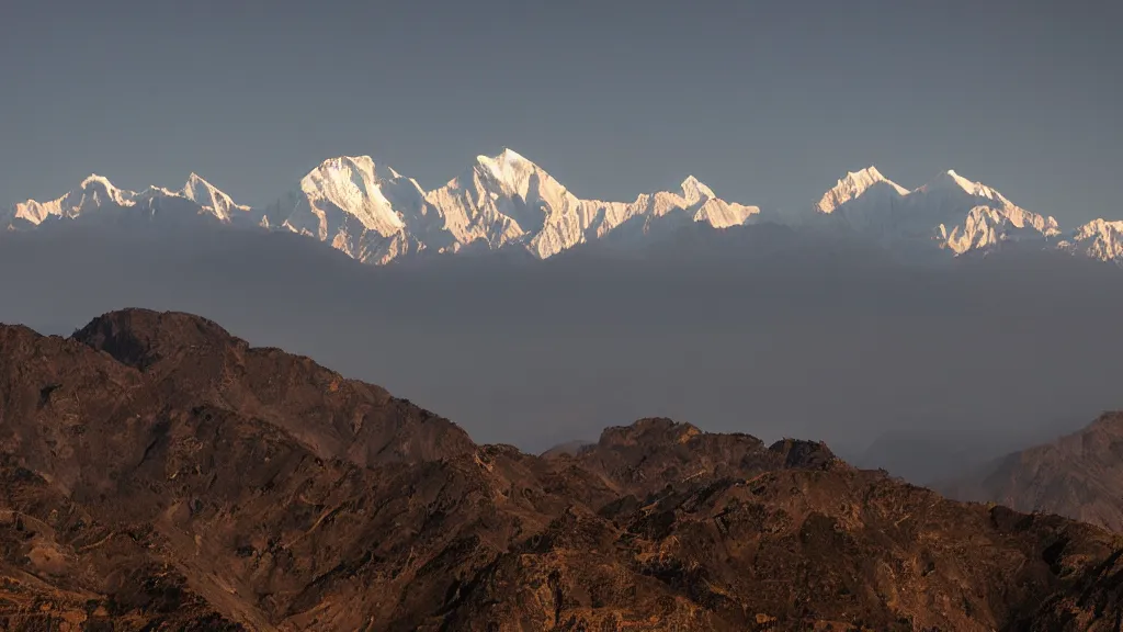 Image similar to moody picture of the Himalayan mountain range with a large McDonalds sign visible in the foreground disturbing the view