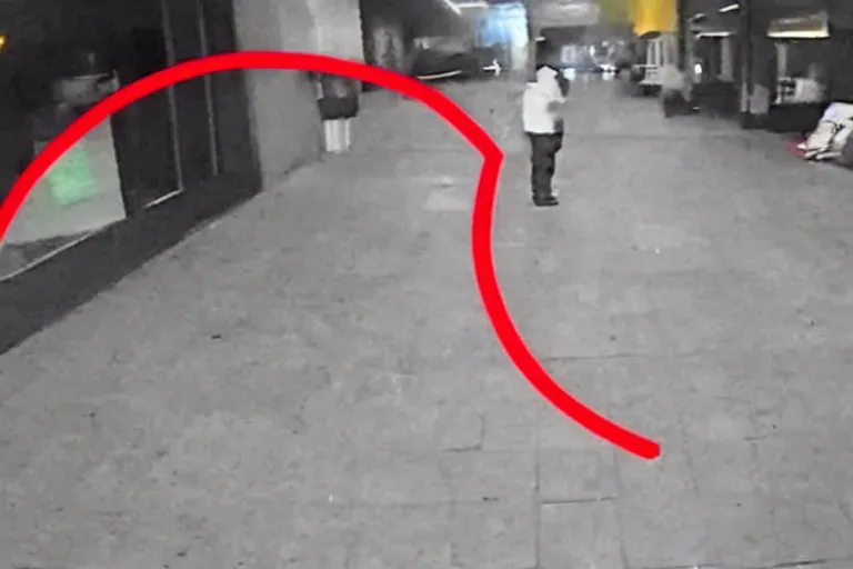 Image similar to cctv footage of a ghost caught on camera with a red circle, low quality 2 4 0 p, trending on facebook