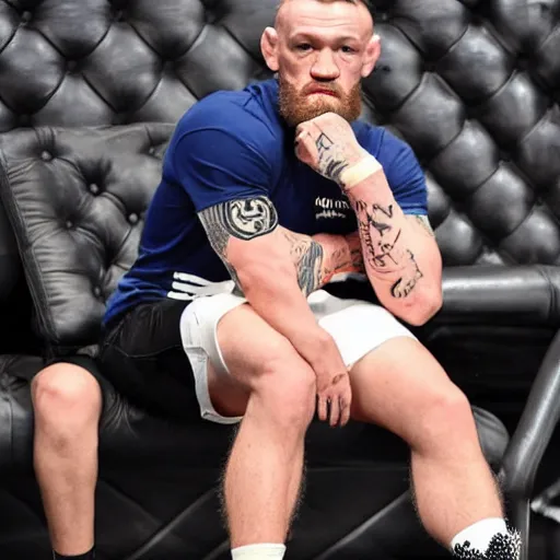 Image similar to conor mcgregor sitting on his chair
