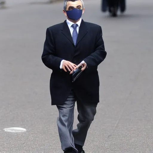 Prompt: rowan atkinson wearing a pandemic mask