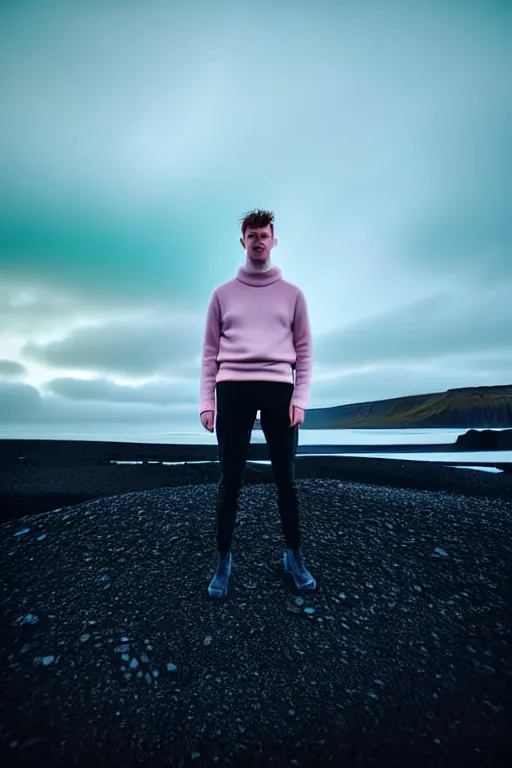 Image similar to high quality pastel coloured film wide angle selfie photograph of a plain looking cute looking male with cyber enhancement standing in an icelandic black rock environment. sarcastic expression. three point light. photographic. art directed. pastel colours. volumetric light. stark. waves. 8 k. filmic.