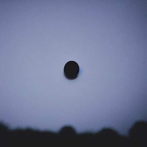 Image similar to a black dot in the sky, dark lighting, alone