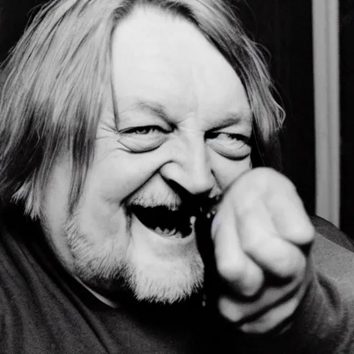 Image similar to robert wyatt laughing maniacally and pointing a gun directly at the camera