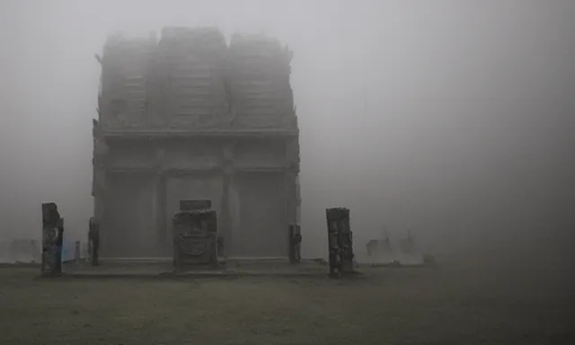 Image similar to a outside temple full of dark evil idol, deep rich decaying bleeding colors!, landscape photograph taken by giger and beksinski and chaos and midnight sun and death fog