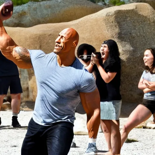 Image similar to photo of Dwayne Johnson throwing a rock to a group of his exited fans