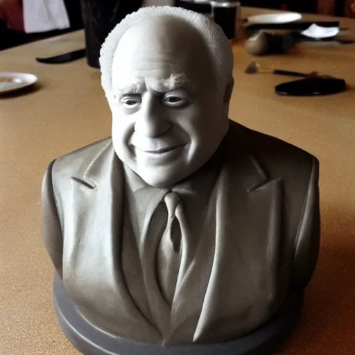 Prompt: a bust of Danny DeVito sculpted from mashed potato