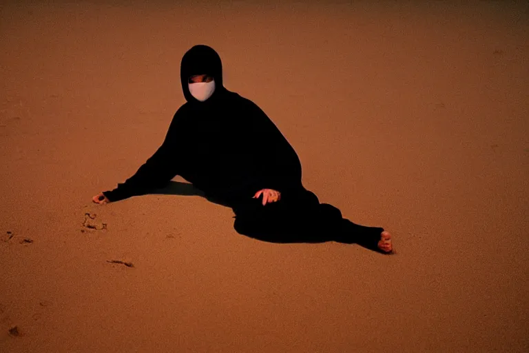 Prompt: a cinematic portrait of a boy wearing a black outfit and a mask connected to water, in a serene vast desert, dune movie, cinematic, movie still, dramatic lighting, by bill henson, 1 6 : 9 ratio