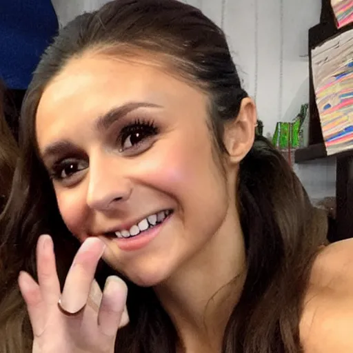 Image similar to nina dobrev as an 👌 emoji