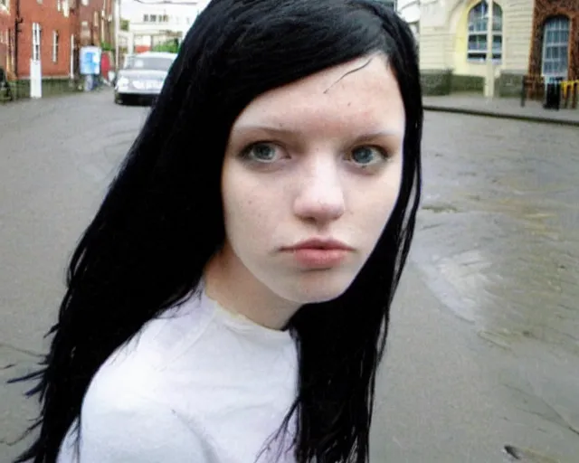 Image similar to poor quality digital photo of an emo girl, black hair, sunny day after rain, british street, 2 0 0 7