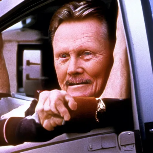 Prompt: john voight is sitting in a van, door open, looking at camera and smiling, he holds up his arms, showing his handcuffs