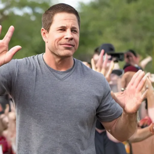 Image similar to a still of Mark Walberg waving