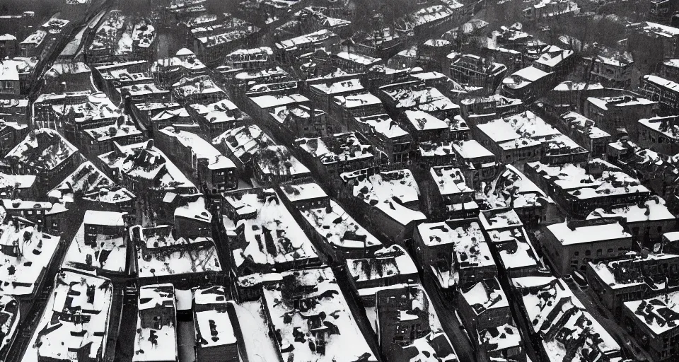 Prompt: aerial image of a street in the winter, black and white photograph by andre kertesz