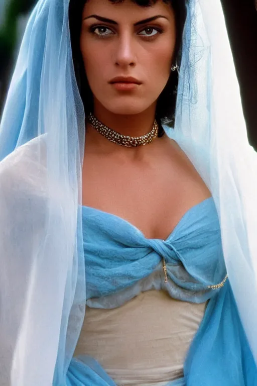 Image similar to young Monica Belluci as an Arab woman, tanned skintone, bright blue eyes, white veil, serious face, light blue decent dress, closeup