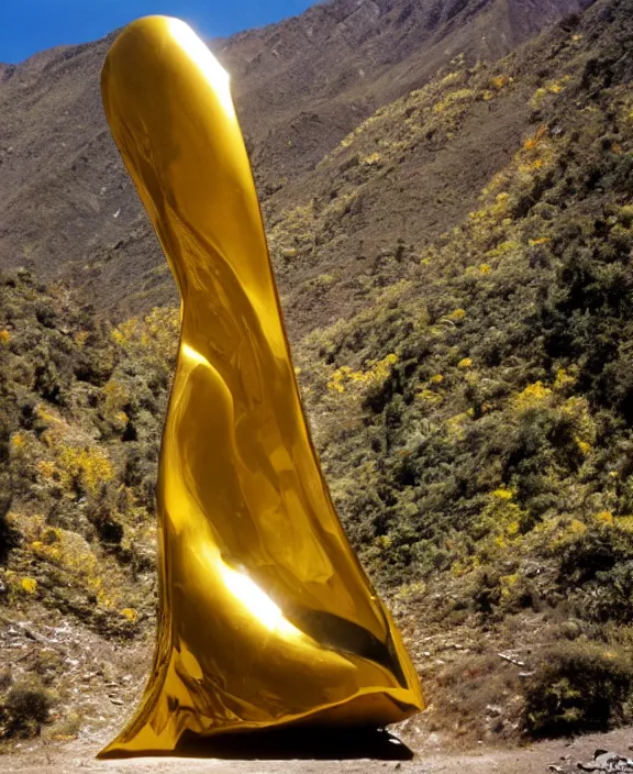 Prompt: vintage color photo of a massive liquid gold sculpture in cordillera de los andes, image by werner herzog