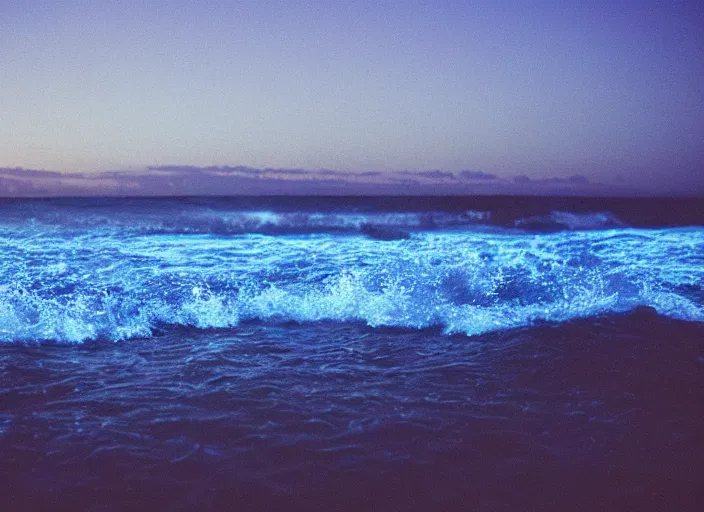 Prompt: photography, ocean at night, blue lighting, glowing city in the distance 35mm film,