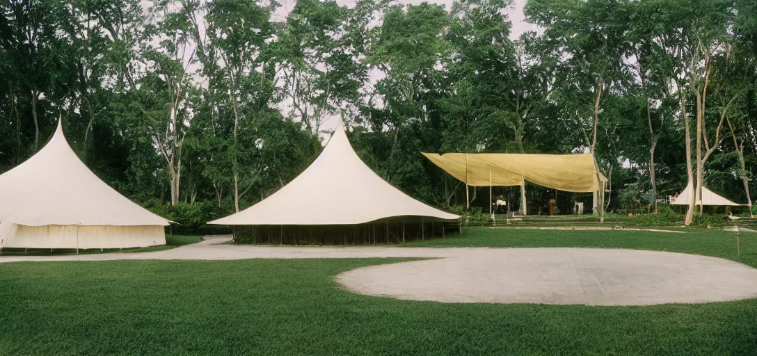 Prompt: sibley tent designed by dali. outdoor landscaping designed by roberto burle marx. fujinon premista 1 9 - 4 5 mm t 2. 9. portra 8 0 0.