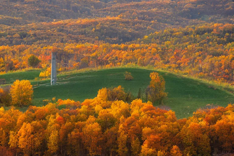 Image similar to a hill with a radio tower next to a pond, autumn hills in background. telephoto lens photography.