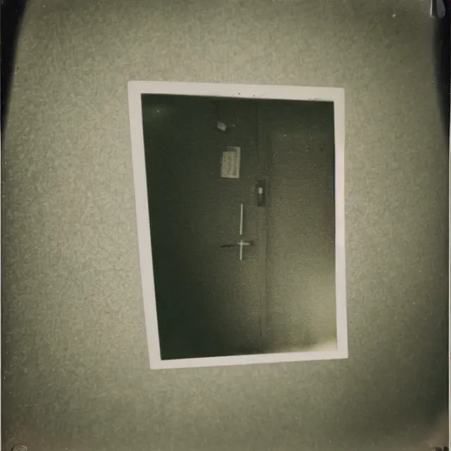 Image similar to found polaroid photo, flash, interior abandoned hospital, spongebob squarepants standing