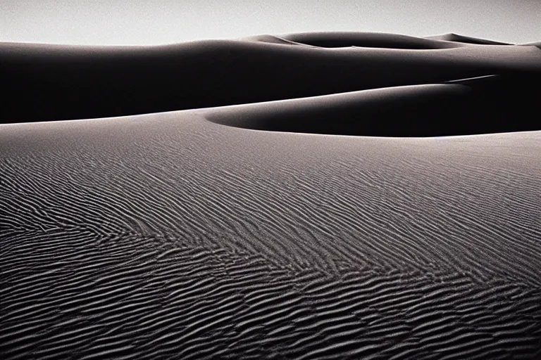 Prompt: a cinematic photograph of a sand wave in a serene vast desert, dune movie, cinematic, movie still, dramatic lighting, by bill henson, 1 6 : 9 ratio