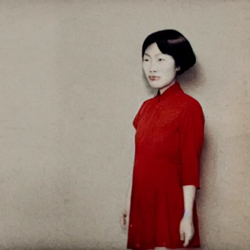 Prompt: a colored photorealistic photo of a chinese canadian girl elisa lam wearing a everyday dress that is red at the cecil hotel in los angeles