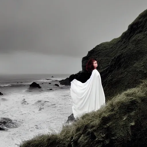 Image similar to dark and moody 1 9 7 0's artistic spaghetti western film in color, a woman in a giant billowy wide long flowing waving white dress transforming into sea spray, standing inside a green mossy irish rocky scenic landscape, crashing waves and sea foam, volumetric lighting, backlit, moody, atmospheric, fog, extremely windy, soft focus