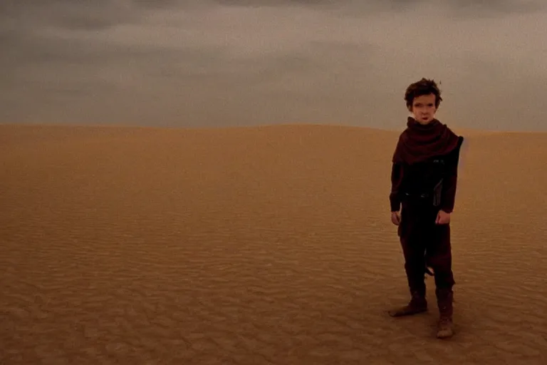 Image similar to a cinematic wide angle shot of a boy in the movie dune, in a serene vast desert, stormy weather, dry, film still, cinematic, movie still, dramatic lighting, by zack snyder