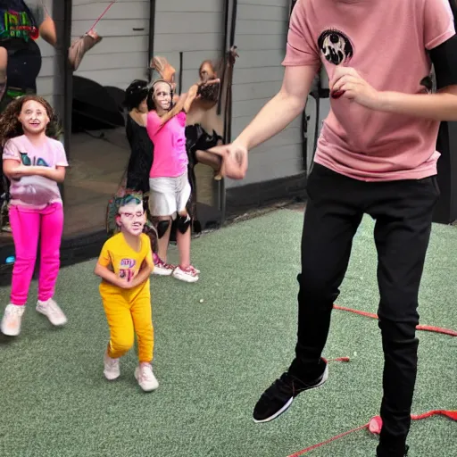 Image similar to pete davidson playing jump rope with a bunch of small girls, cheering him on, pete davidson is wearing all black