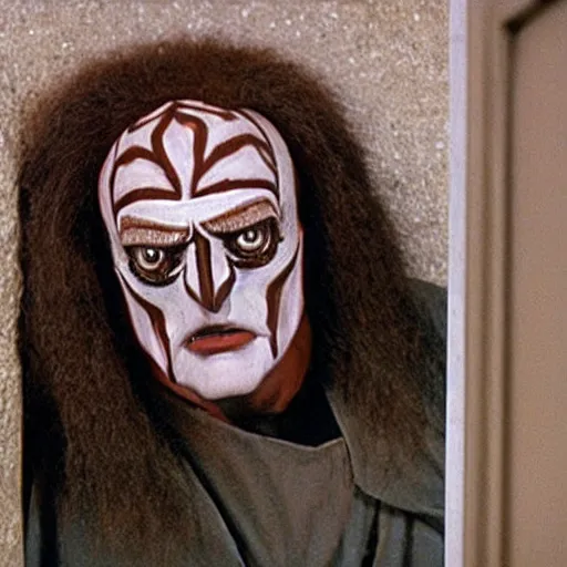 Prompt: The character known as Gowron the Klingon, in full Klingon theatrical makeup and Klingon uniform standing in a dingy gas station bathroom stall near the toilet, kneeling and looking at a small hole carved into the stall wall