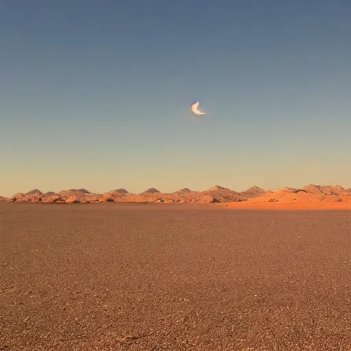 Image similar to clear blue desert sky with one clouf ormation in the shape of a dragon